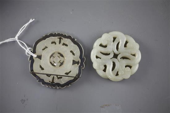 Two Chinese pale celadon jade bi discs, 18th/19th century, 5.4cm,